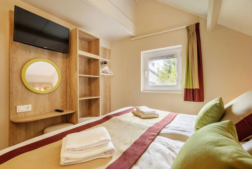 Slaapkamer, bungalow VIP Center Parcs Les Ardennes