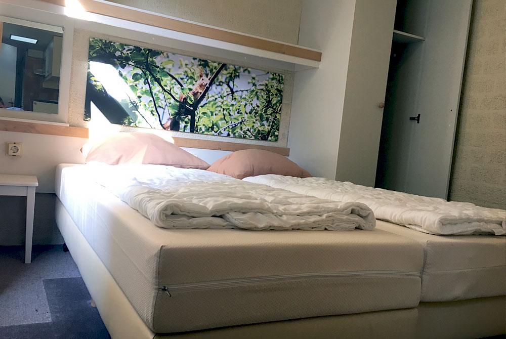 Slaapkamer van de cottage, Center Parcs De Huttenheugte