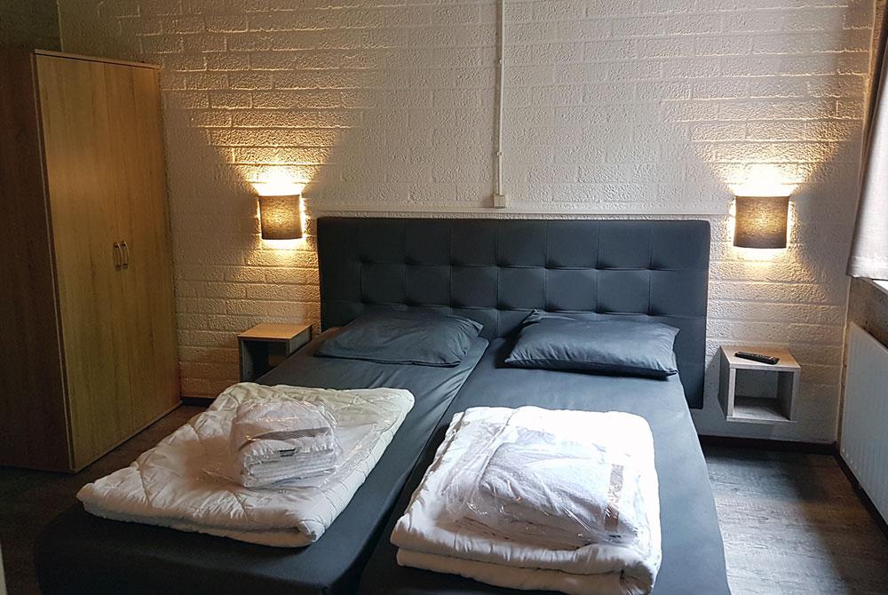 Slaapkamer in de bungalow, Vakantiepark Weerterbergen