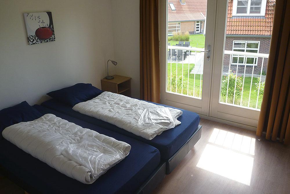 Slaapkamer met balkon, Landal Waterparc Veluwemeer