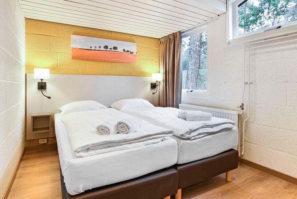 Slaapkamer in de 4-persoonsbungalow, Landal De Lommerbergen