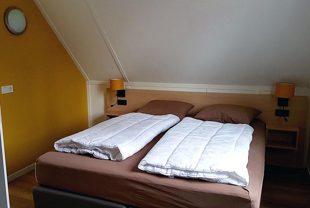 Slaapkamer in de 4-persoonsbungalow, Landal De Vers