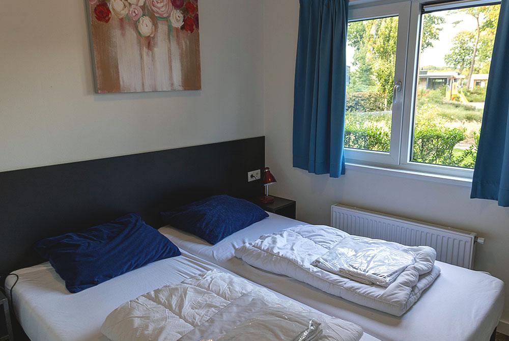 Slaapkamer in vakantie villa, Vakantiepark Ackersate