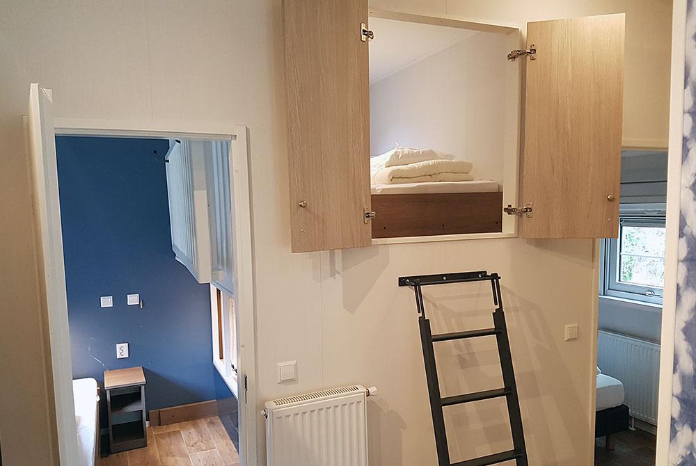 Slaapkamers in de lodge, Kampeerdorp de Zandstuve