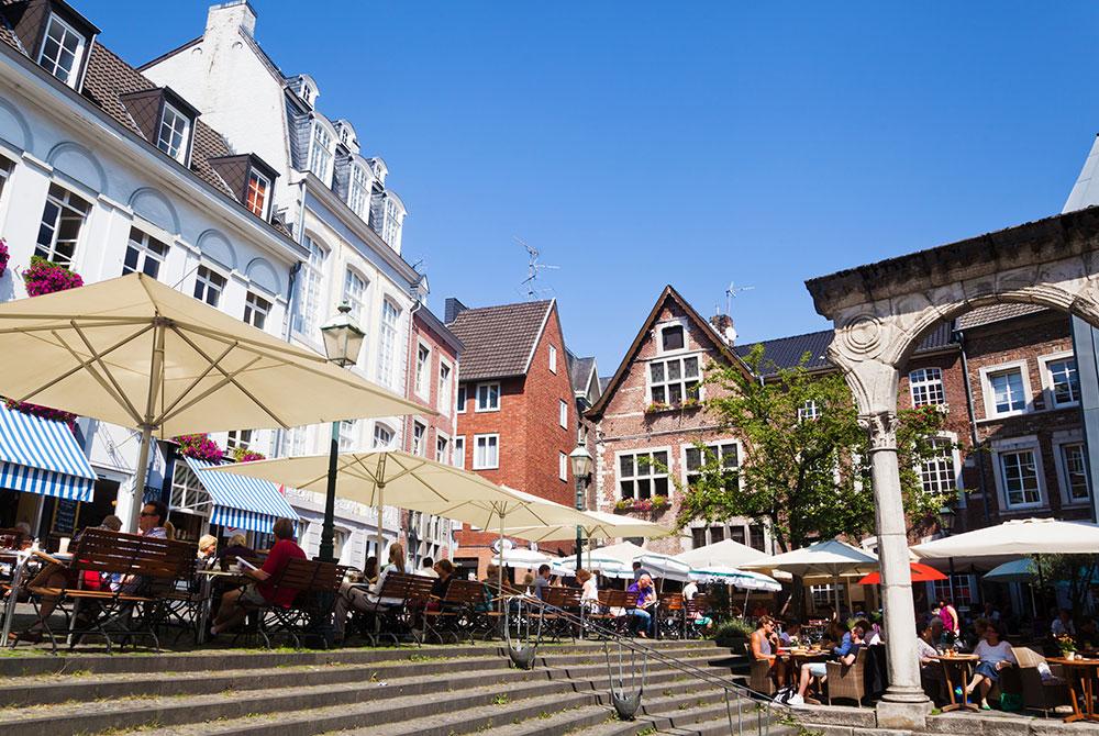 terras in Aken, stedentrip Aken